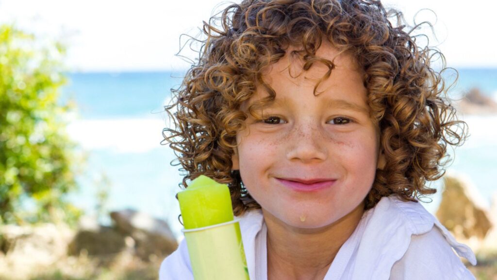 Cute boy eating ice cream