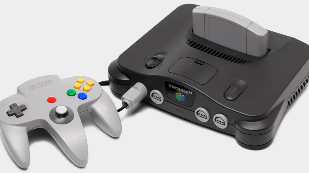 A Nintendo 64 video game console shown with gray controller
