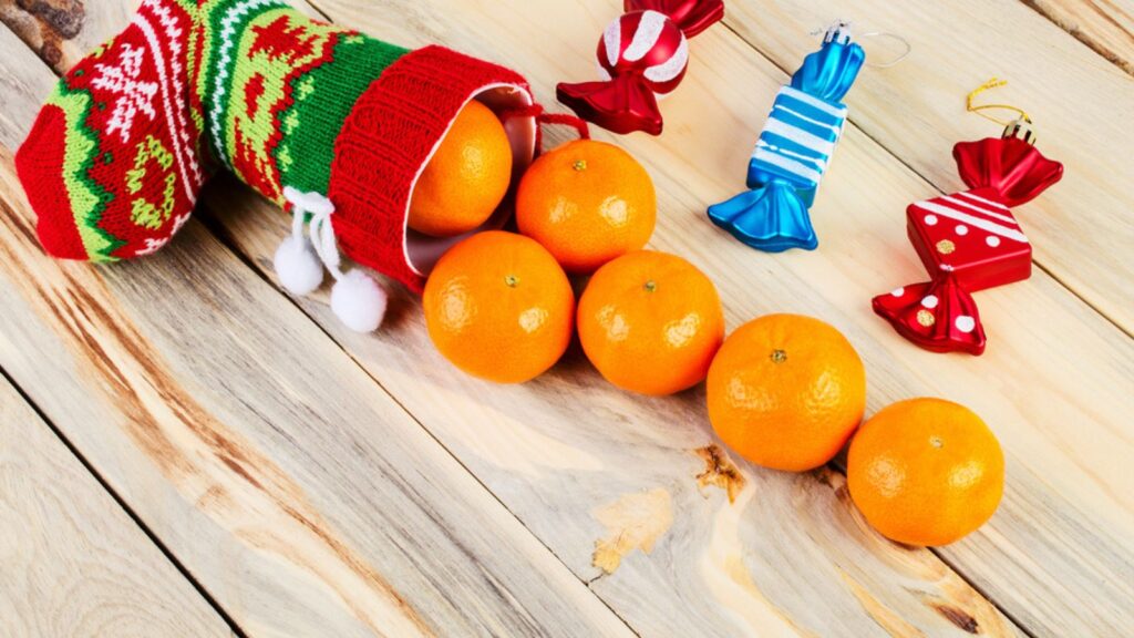 On the table is a colorful Christmas sock.