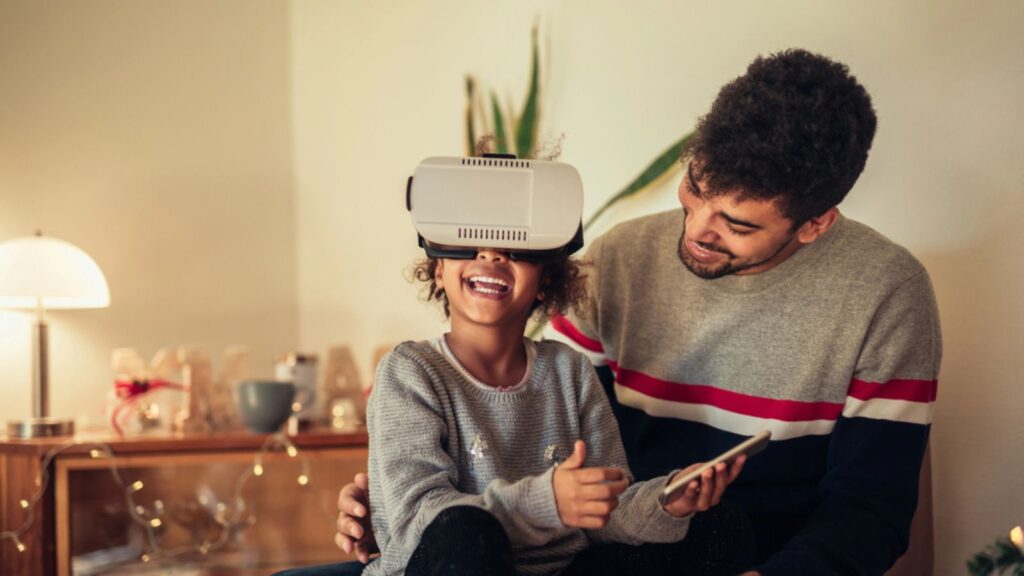 Cute African American girl trying VR headset